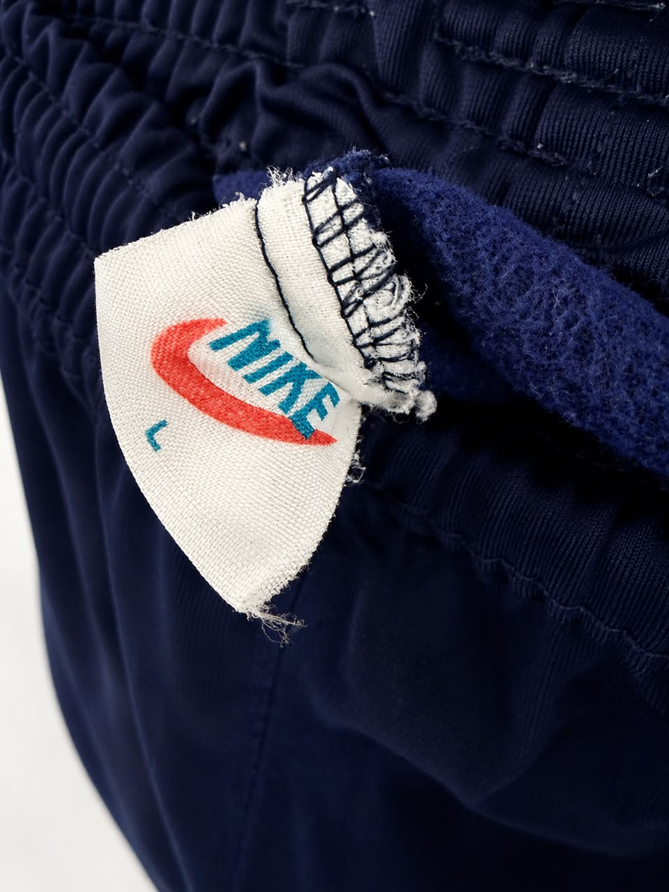 Nike Γυναικείο Παντελόνι Φόρμας Μπλε Σκούρο με Ροζ Λεπτομέρειες L